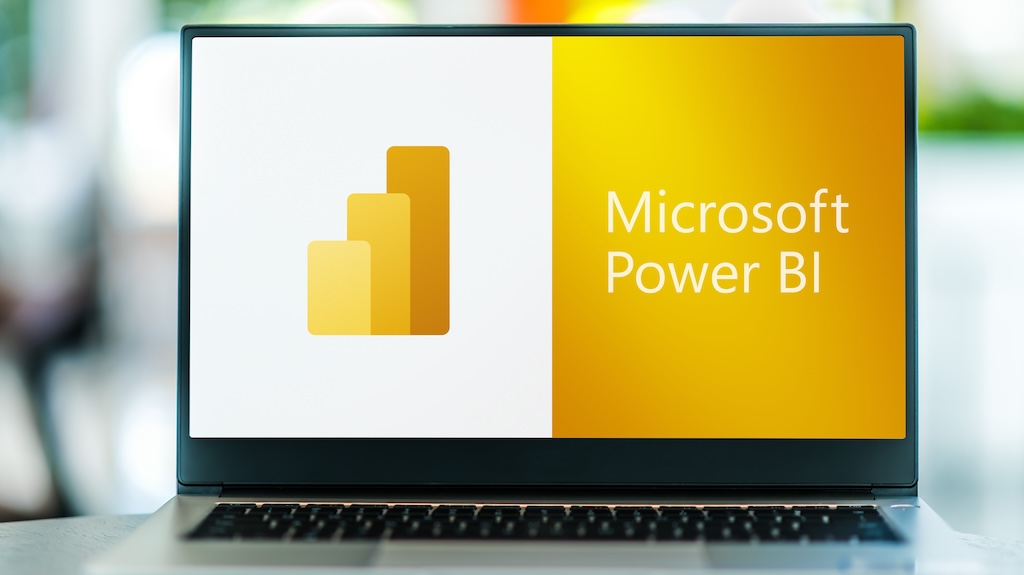 POZNAN, POL - JUL 3, 2021: Laptop computer displaying logo of Power BI, a business analytics service by Microsoft