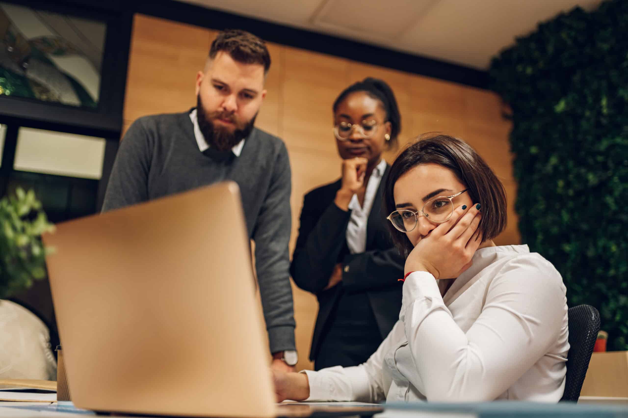 Stressed business team having a meeting in the office and solving a problem